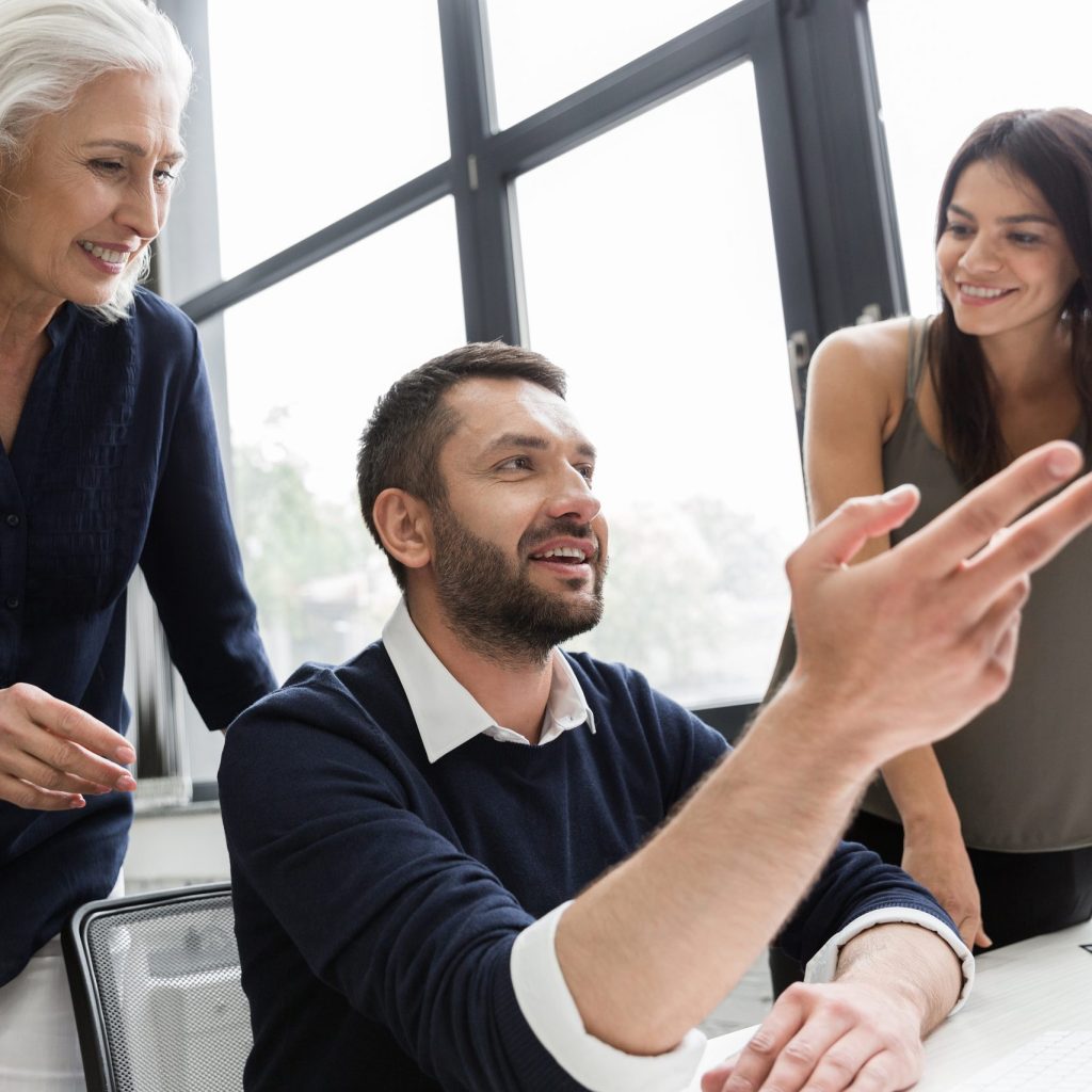 group of business people discussing financial plan at the table in an office